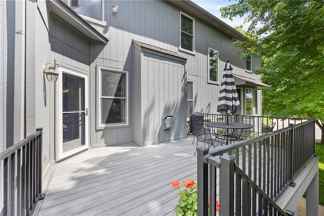 14692 S Garnett St, Olathe, KS 66062 - wooden deck with outdoor dining area