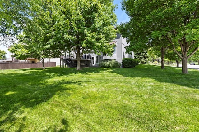 14692 S Garnett St, Olathe, KS 66062 - view of yard featuring stairs and a deck