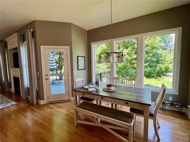 14692 S Garnett St, Olathe, KS 66062 - dining area with light wood-type flooring and plenty of natural light