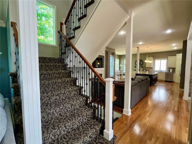 14692 S Garnett St, Olathe, KS 66062 - stairway featuring wood finished floors and recessed lighting