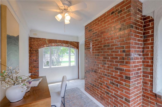 722 E Meyer Blvd, Kansas City, MO 64131 - office with crown molding, brick wall, and a ceiling fan