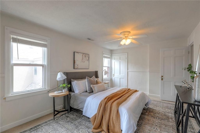 722 E Meyer Blvd, Kansas City, MO 64131 - bedroom featuring baseboards and ceiling fan