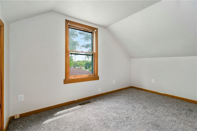 1910 Ottawa St, Leavenworth, KS 66048 - bonus room featuring vaulted ceiling, baseboards, and carpet floors