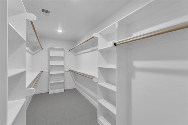 walk in closet with carpet flooring and visible vents