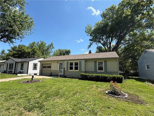 single story home featuring an attached garage, a chimney, and concrete driveway