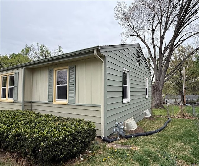 view of property exterior with board and batten siding
