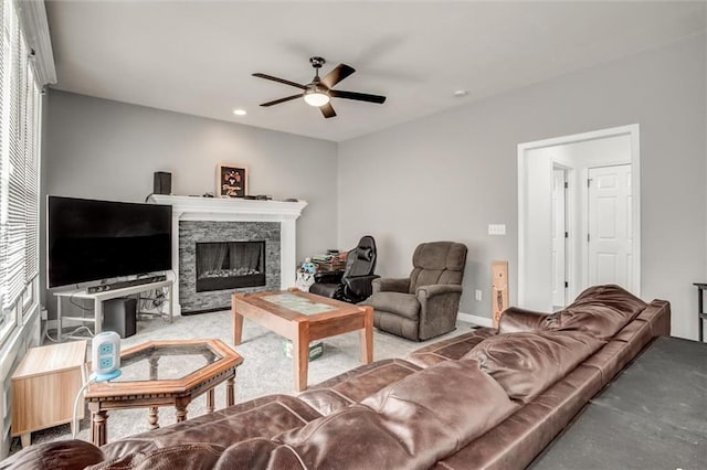 6700 N Charlston Dr, Kansas City, MO 64119 - living area featuring a ceiling fan, a fireplace, recessed lighting, and baseboards