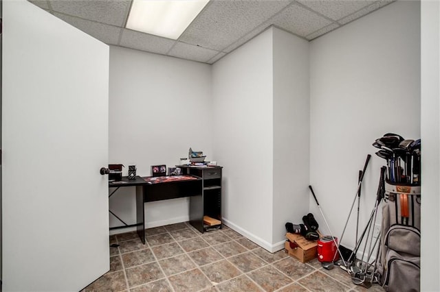 6700 N Charlston Dr, Kansas City, MO 64119 - misc room featuring a drop ceiling and baseboards