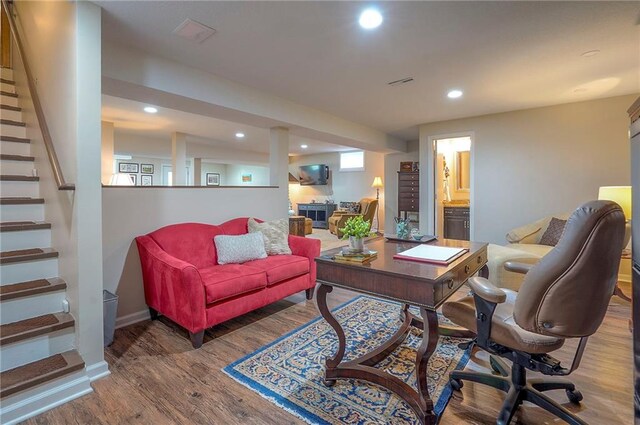 office with wood finished floors, recessed lighting, and baseboards