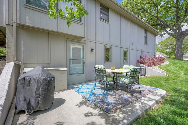 view of patio featuring outdoor dining space and central AC unit