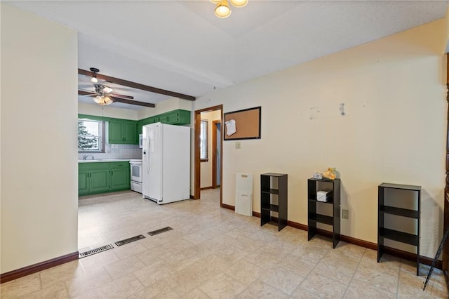 515 London Way, Belton, MO 64012 - living room with a ceiling fan, baseboards, and beamed ceiling