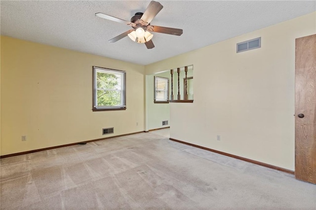 515 London Way, Belton, MO 64012 - carpeted empty room featuring ceiling fan, a textured ceiling, and baseboards