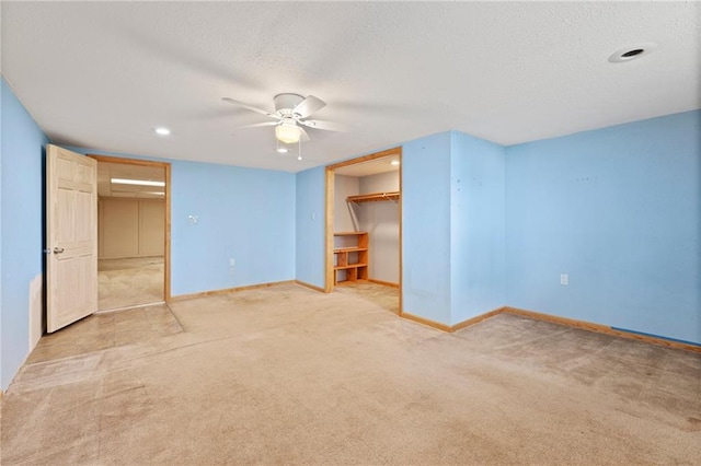 515 London Way, Belton, MO 64012 - unfurnished bedroom with baseboards, carpet, ceiling fan, a textured ceiling, and recessed lighting