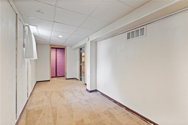 515 London Way, Belton, MO 64012 - hall featuring carpet, a paneled ceiling, and baseboards