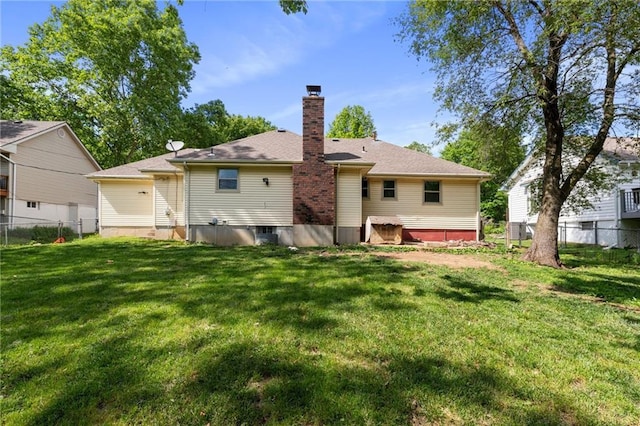 515 London Way, Belton, MO 64012 - back of house with a chimney