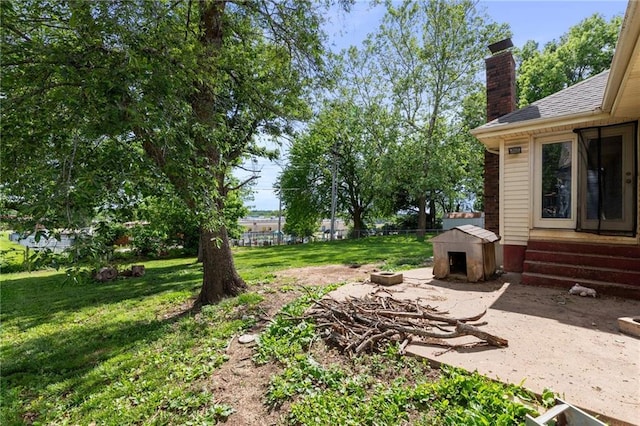 515 London Way, Belton, MO 64012 - view of grassy yard with entry steps