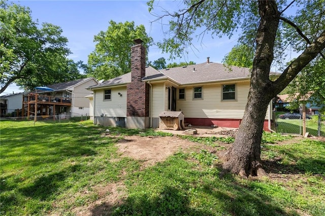 515 London Way, Belton, MO 64012 - rear view of property featuring a chimney