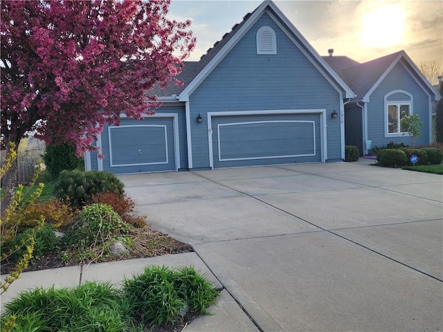 view of front facade featuring driveway and a garage