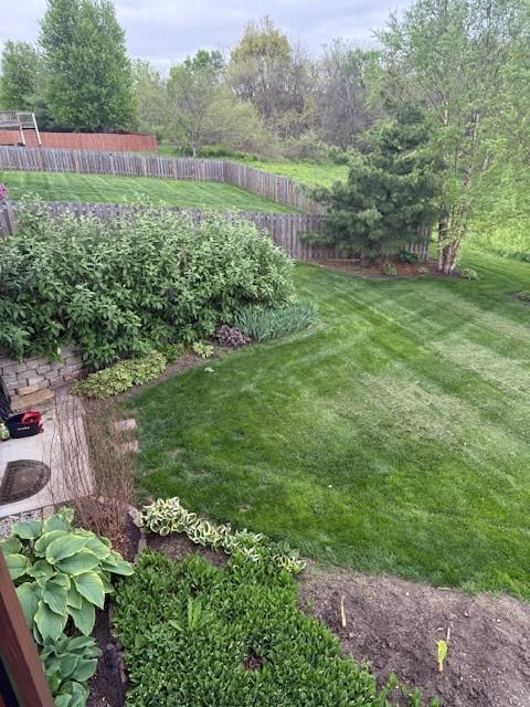 view of yard with fence