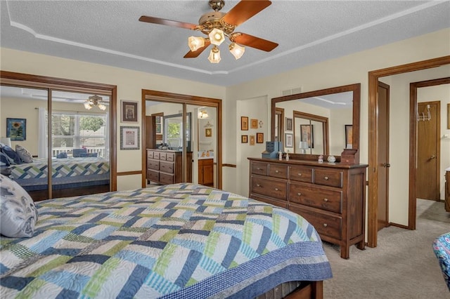 16611 E 53rd St, Independence, MO 64055 - bedroom with light carpet, a textured ceiling, and a ceiling fan