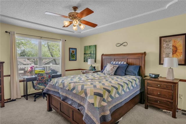 16611 E 53rd St, Independence, MO 64055 - bedroom featuring carpet flooring, a textured ceiling, and a ceiling fan