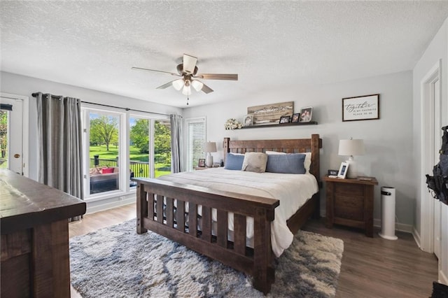 17201 NE 136th St, Kearney, MO 64060 - bedroom featuring access to outside, a textured ceiling, wood finished floors, and ceiling fan