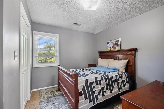 17201 NE 136th St, Kearney, MO 64060 - bedroom featuring carpet, a textured ceiling, and a closet