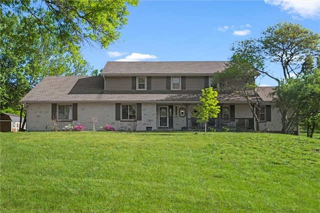 17201 NE 136th St, Kearney, MO 64060 - view of front of property featuring a front yard, a storage shed, and a porch