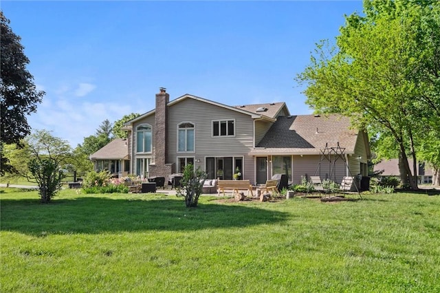 17201 NE 136th St, Kearney, MO 64060 - rear view of house featuring a chimney, a patio area, and a lawn