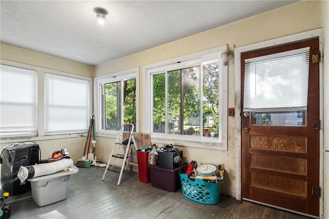 sunroom / solarium with wood-type flooring