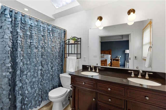 11004 N Kentucky Pl, Kansas City, MO 64157 - full bath featuring ensuite bathroom, double vanity, toilet, tile patterned flooring, and a shower with shower curtain