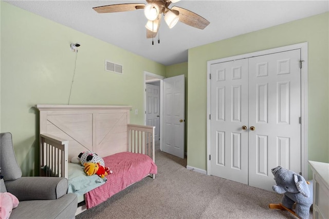 11004 N Kentucky Pl, Kansas City, MO 64157 - bedroom with carpet, a closet, a ceiling fan, and baseboards