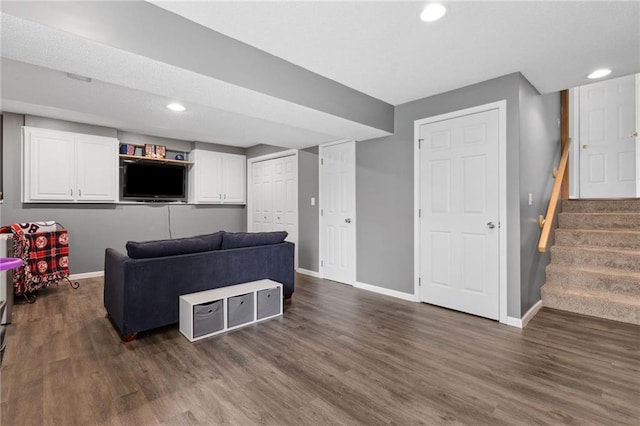 11004 N Kentucky Pl, Kansas City, MO 64157 - living area featuring baseboards, dark wood-style floors, recessed lighting, and stairs