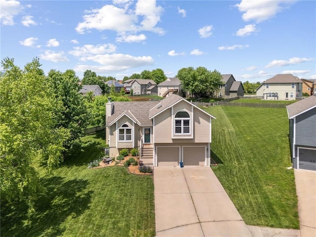 11004 N Kentucky Pl, Kansas City, MO 64157 - view of front facade with a residential view, a garage, concrete driveway, and a front yard