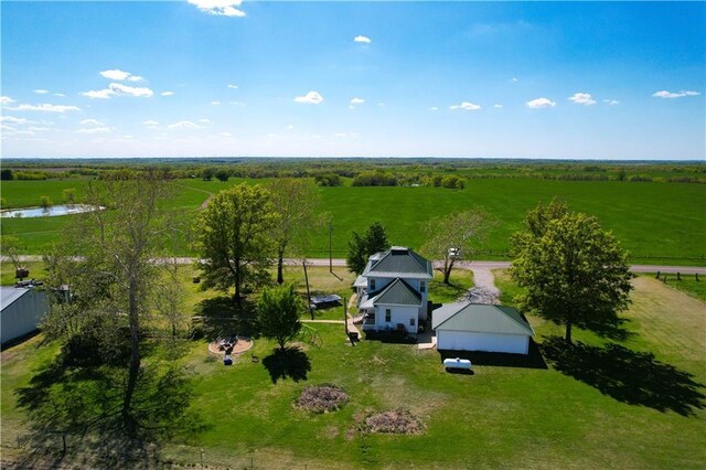 bird's eye view featuring a water view and a rural view