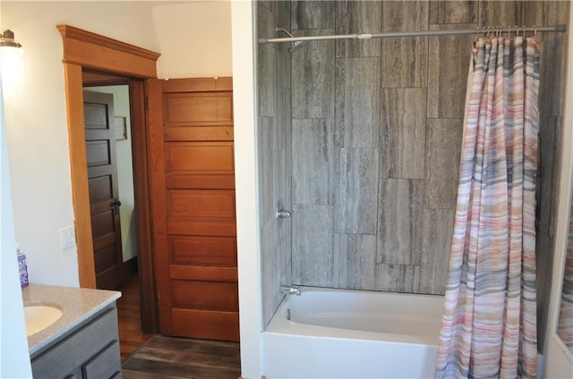 full bathroom with vanity, shower / bath combination with curtain, and wood finished floors