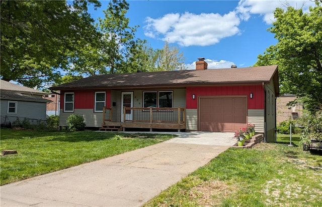 single story home featuring a garage, covered porch, a chimney, a front yard, and concrete driveway