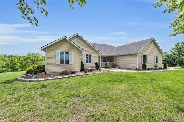single story home with a front lawn
