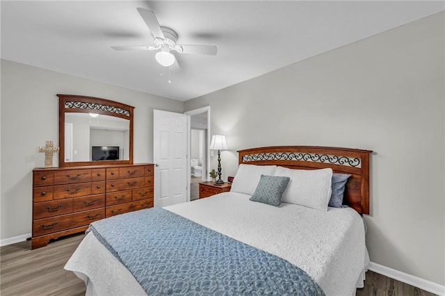 bedroom with baseboards, wood finished floors, and ceiling fan