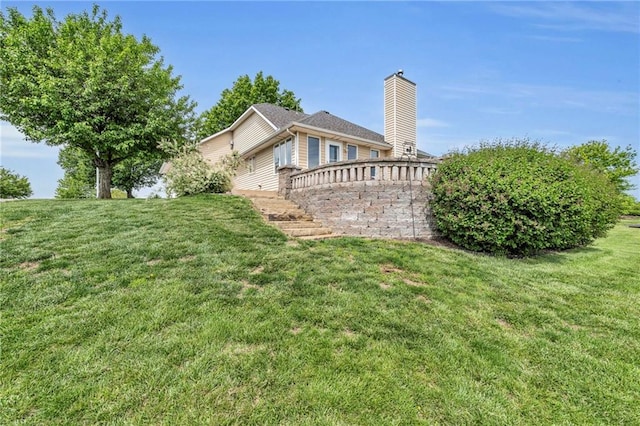 view of grassy yard featuring a wooden deck