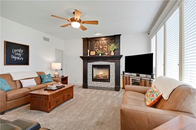 8904 NE 94th Pl, Kansas City, MO 64157 - living room featuring ceiling fan, carpet, a fireplace, and baseboards