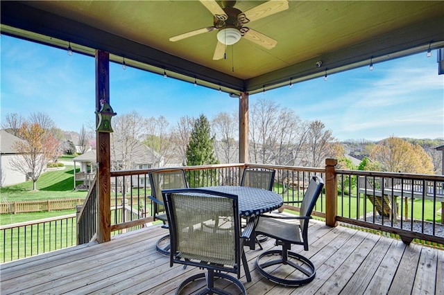 8904 NE 94th Pl, Kansas City, MO 64157 - deck featuring ceiling fan and outdoor dining space