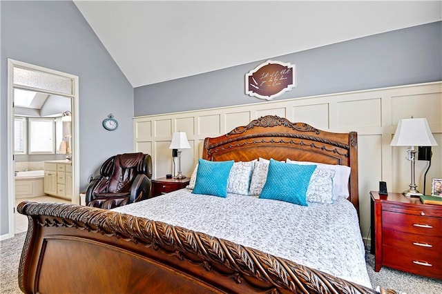 8904 NE 94th Pl, Kansas City, MO 64157 - bedroom with carpet, lofted ceiling, and connected bathroom