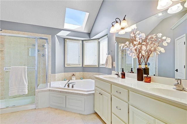 8904 NE 94th Pl, Kansas City, MO 64157 - bathroom featuring lofted ceiling, a skylight, a bath, tile patterned floors, and double vanity