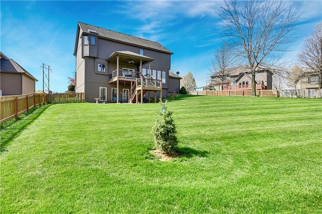 8904 NE 94th Pl, Kansas City, MO 64157 - back of property featuring stairs and a wooden deck