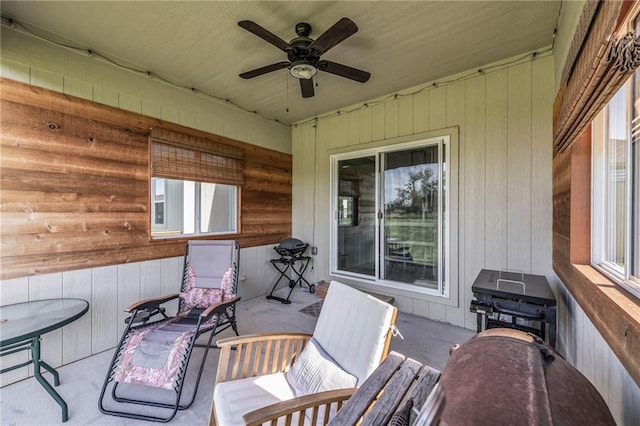 view of patio featuring a ceiling fan
