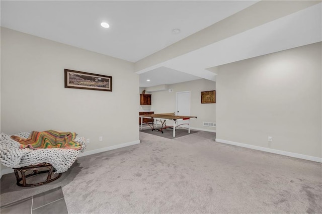 sitting room with carpet flooring, baseboards, and recessed lighting