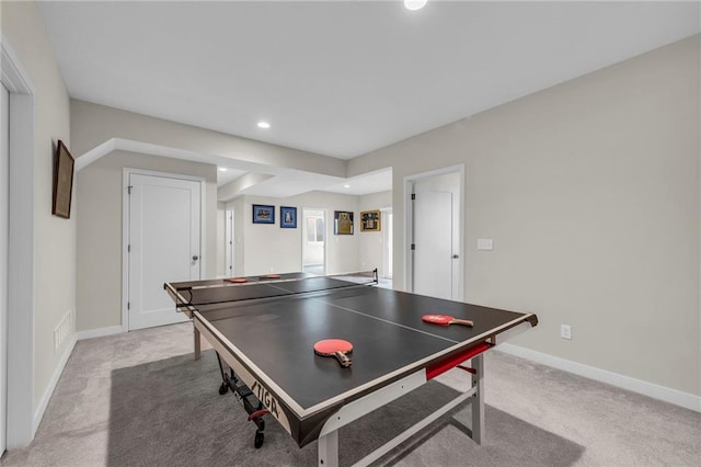 playroom with light colored carpet, recessed lighting, and baseboards