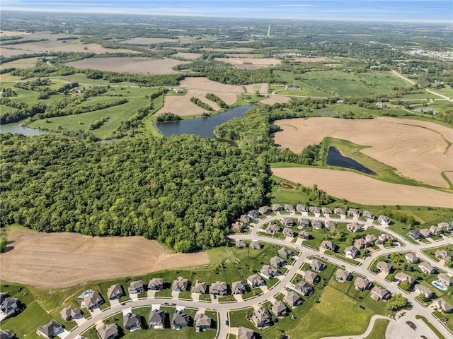 aerial view of property's location with a large body of water