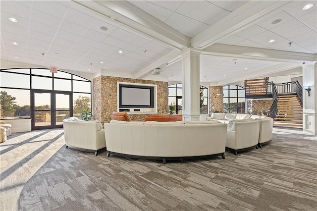 community lobby featuring stairs and recessed lighting